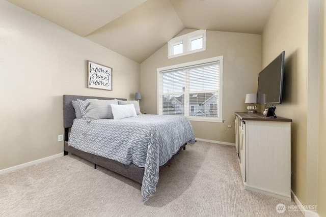 bedroom featuring vaulted ceiling, baseboards, and light carpet