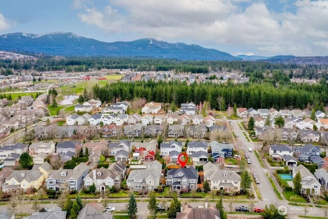 aerial view featuring a residential view and a mountain view