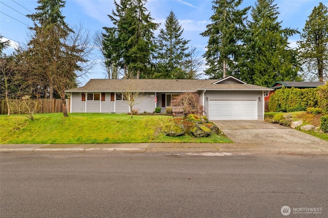 single story home with an attached garage, concrete driveway, a front yard, and fence