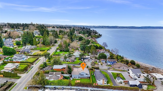 aerial view featuring a water view and a residential view