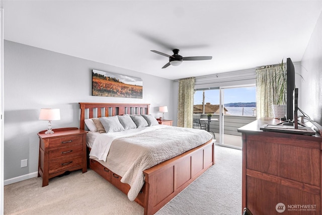 bedroom with light carpet, baseboards, ceiling fan, and access to outside