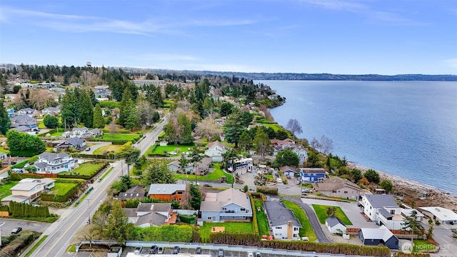 aerial view with a residential view and a water view