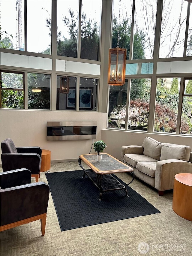 sunroom featuring a healthy amount of sunlight