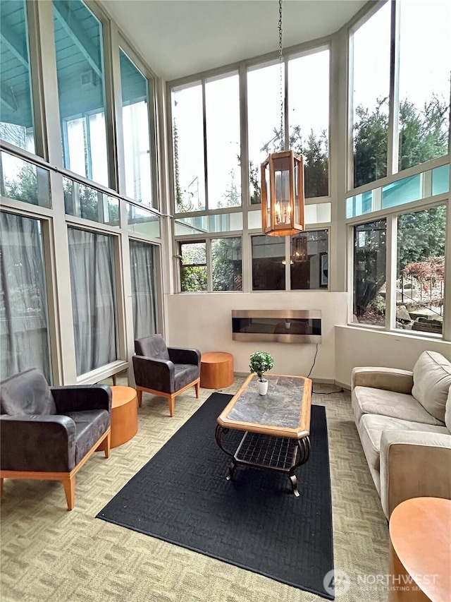 sunroom / solarium featuring a healthy amount of sunlight