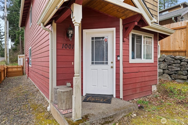 property entrance featuring fence