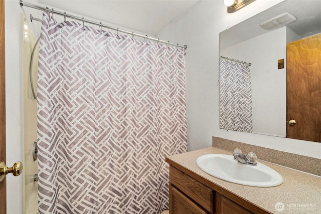 bathroom with visible vents, vanity, and a shower with shower curtain