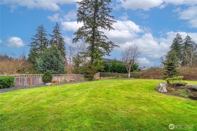 view of yard featuring fence