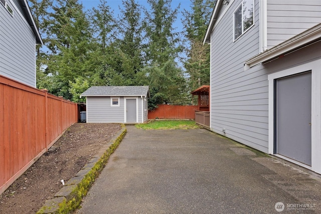 garage with fence