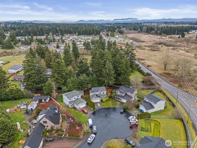 aerial view with a residential view and a mountain view