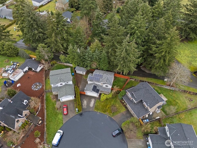 birds eye view of property with a residential view