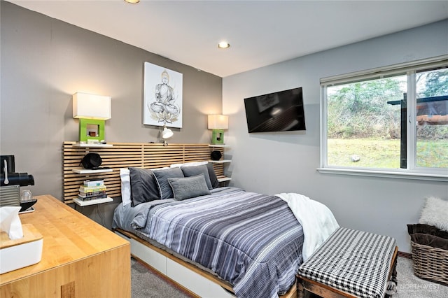 bedroom with recessed lighting and carpet floors