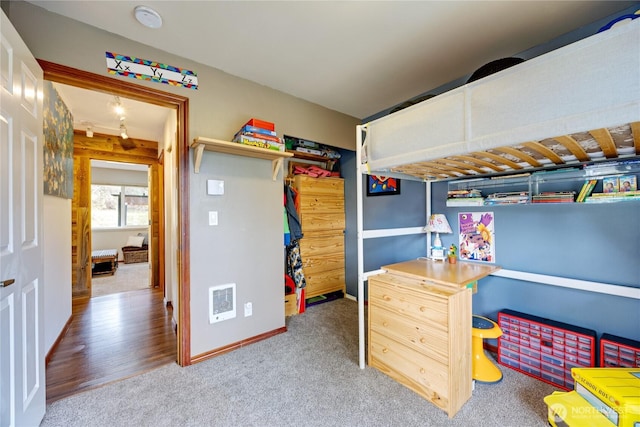 bedroom featuring visible vents, baseboards, and carpet floors