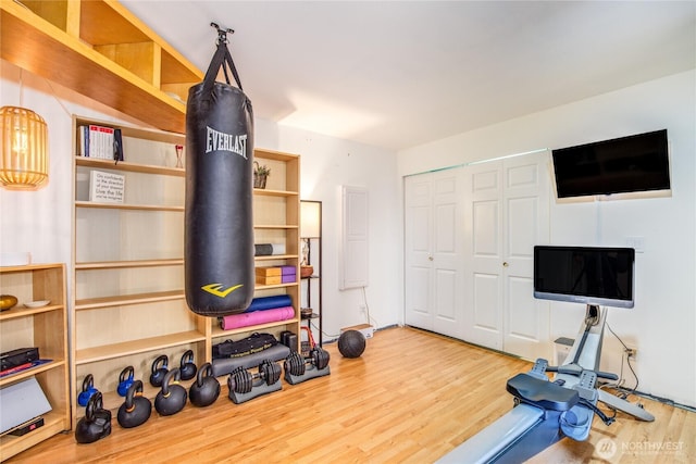 workout room with wood finished floors