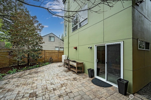 view of patio / terrace with fence