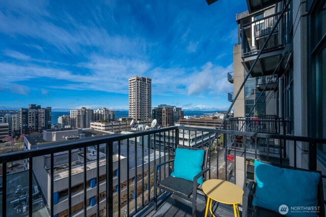 balcony featuring a view of city