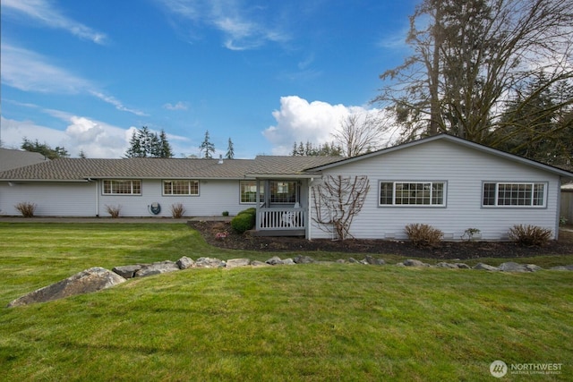 single story home featuring a front yard