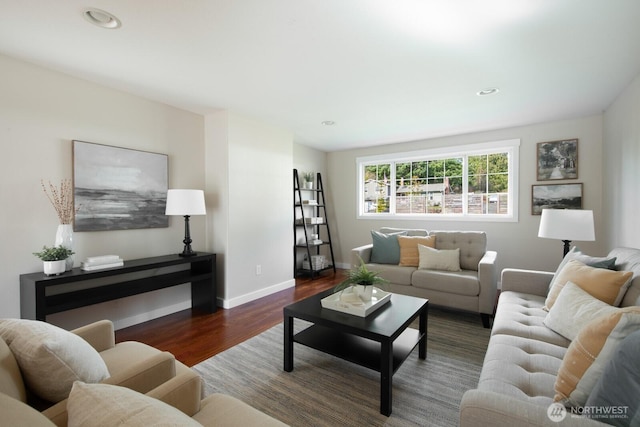 living room featuring recessed lighting, wood finished floors, and baseboards