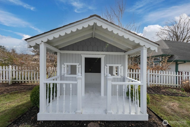 view of outdoor structure with fence