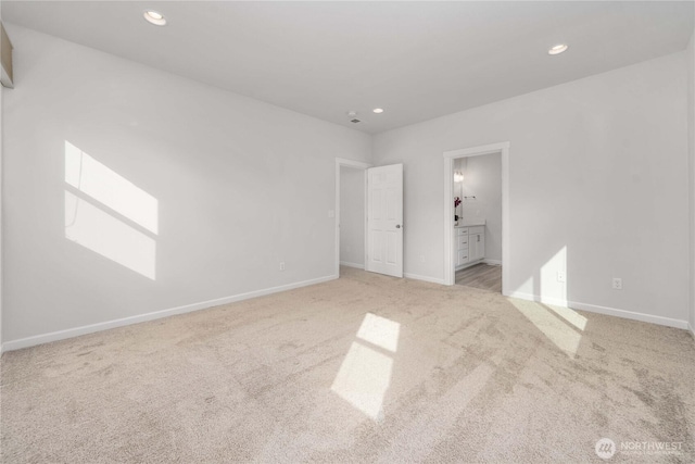 unfurnished bedroom with recessed lighting, carpet, and baseboards