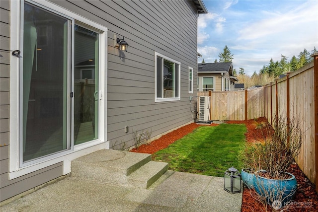 view of yard with a fenced backyard