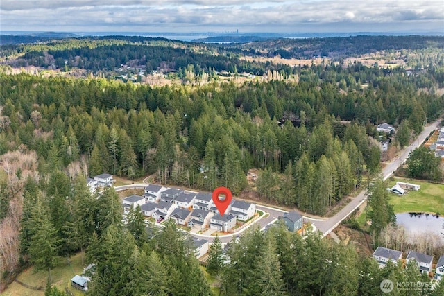 bird's eye view featuring a view of trees