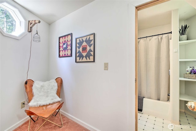 full bathroom featuring baseboards and shower / tub combo with curtain