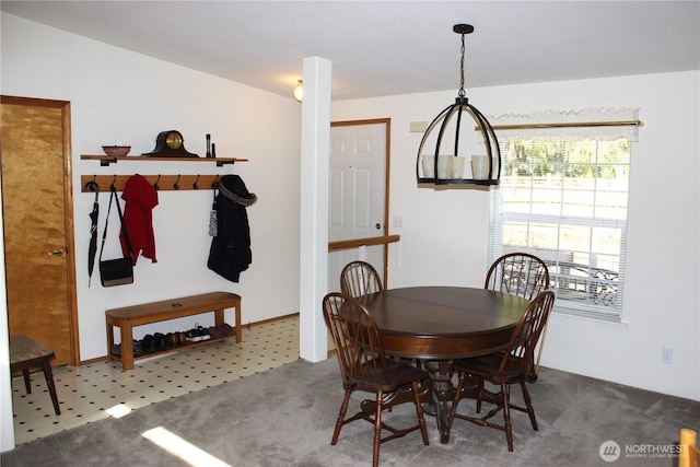 view of carpeted dining space