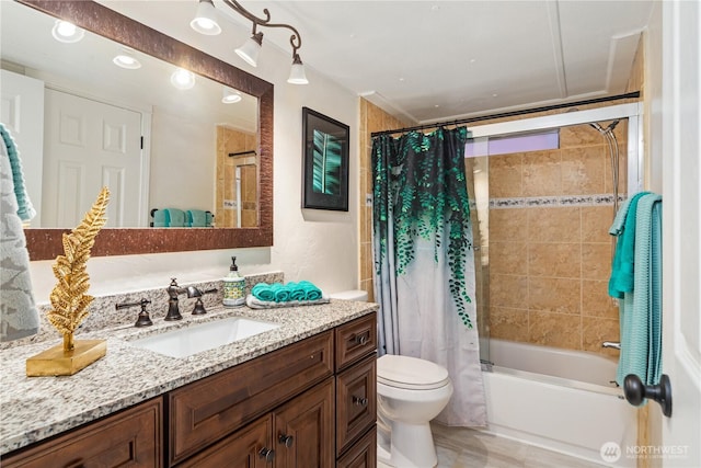 full bathroom with vanity, toilet, and shower / tub combo