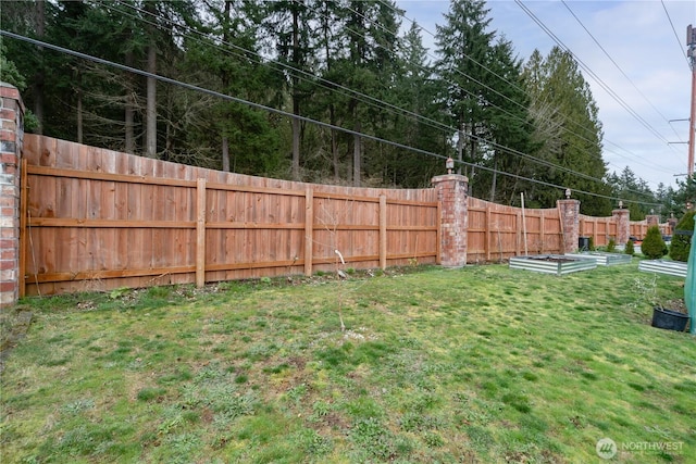 view of yard with fence