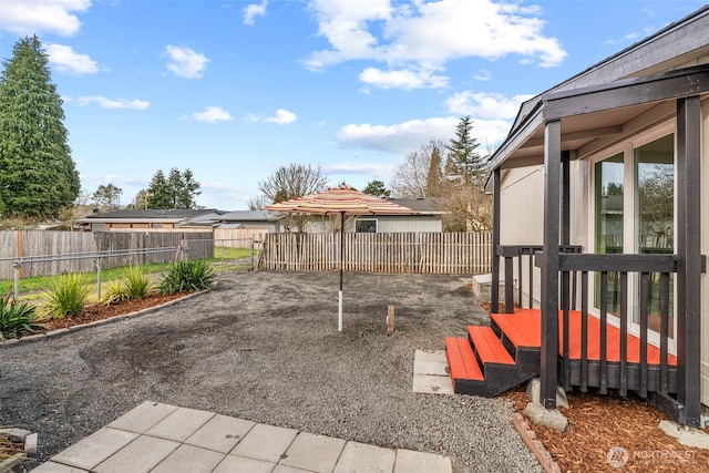 view of yard with a patio and a fenced backyard