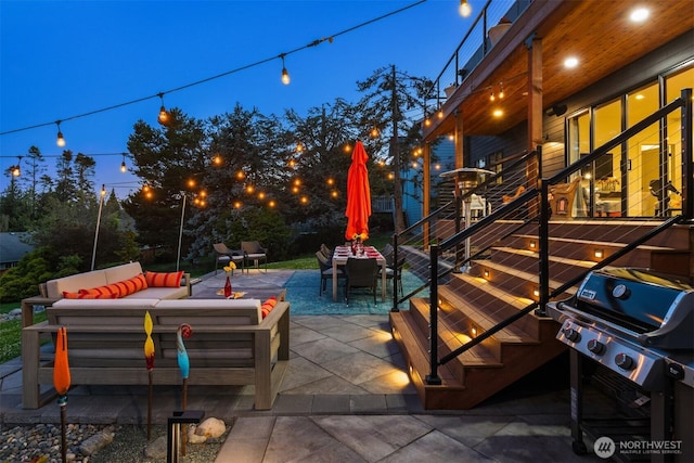 view of patio / terrace featuring an outdoor living space, outdoor dining area, and area for grilling