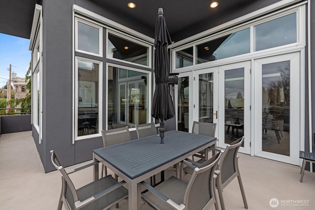 view of patio / terrace featuring french doors and outdoor dining space