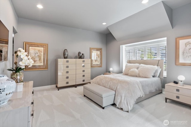 bedroom with recessed lighting, baseboards, and light carpet