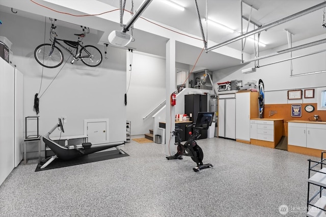 exercise room featuring a garage