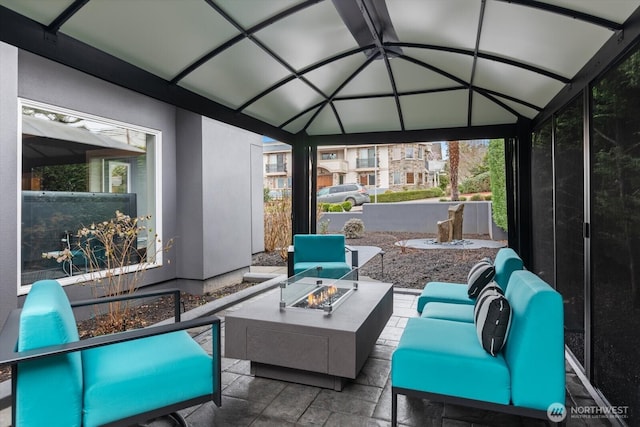 view of patio featuring an outdoor fire pit