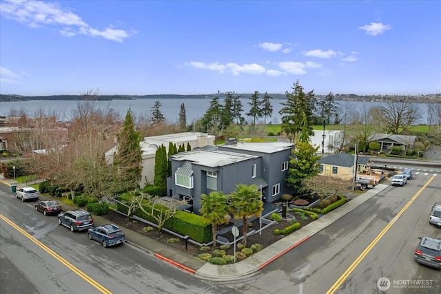 bird's eye view with a water view