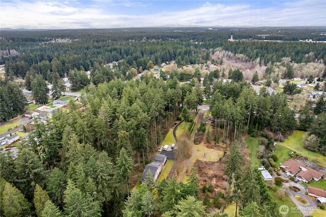 bird's eye view with a view of trees