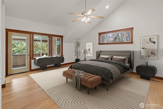 bedroom featuring access to exterior, visible vents, baseboards, lofted ceiling, and light wood-style floors