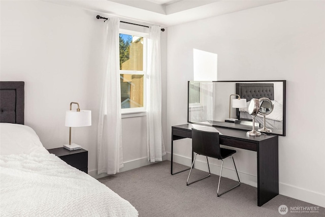 bedroom featuring carpet flooring and baseboards