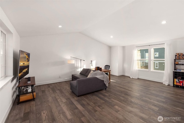 interior space featuring dark wood finished floors, recessed lighting, baseboards, and vaulted ceiling