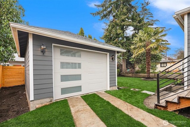 garage featuring fence