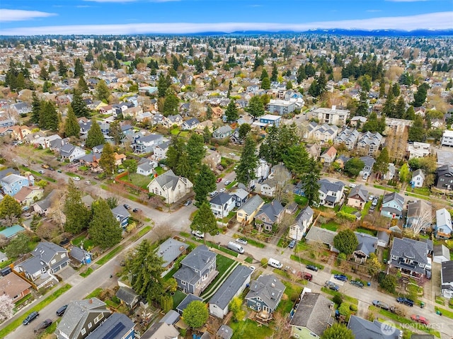 birds eye view of property with a residential view