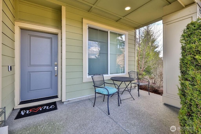 doorway to property featuring a porch