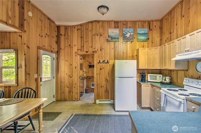 kitchen with a baseboard heating unit, white appliances, wooden walls, and under cabinet range hood