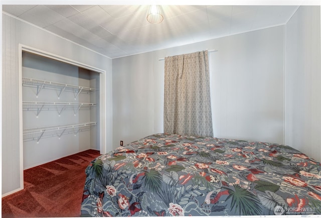 bedroom featuring a closet and carpet floors