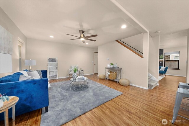 living area featuring recessed lighting, stairs, ceiling fan, and wood finished floors