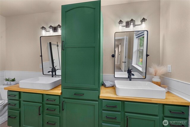 full bathroom with vanity