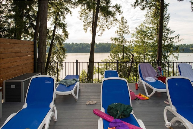 deck featuring a water view