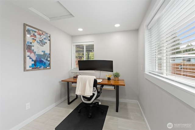 home office featuring recessed lighting, attic access, light wood-type flooring, and baseboards