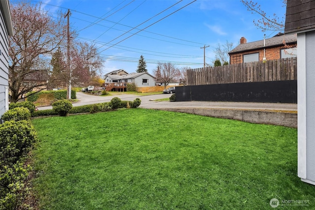 view of yard featuring fence